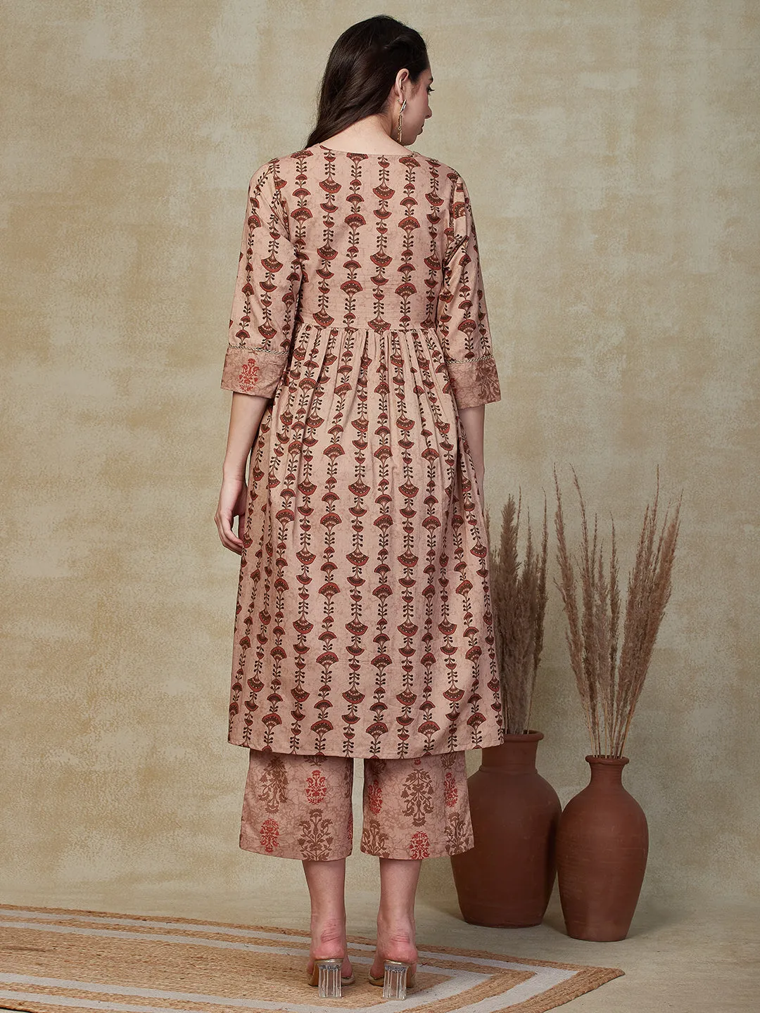 Ethnic & Stripes Printed & Embroidered A-Line Kurta with Pant - Brown