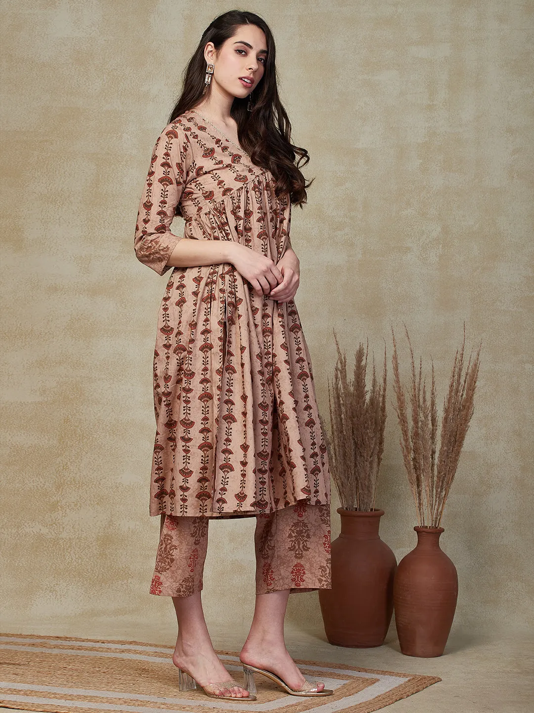 Ethnic & Stripes Printed & Embroidered A-Line Kurta with Pant - Brown